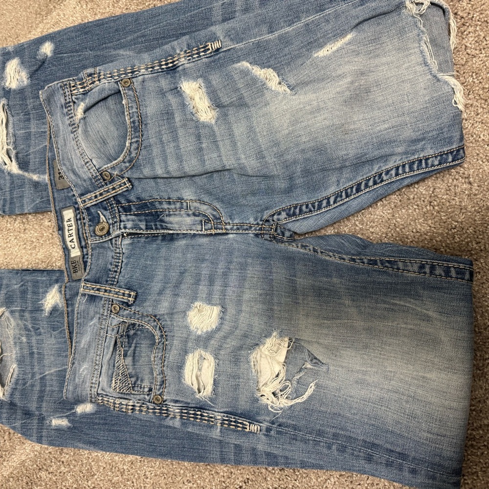 Distressed Blue Boyfriend Jeans with Vintage Fading